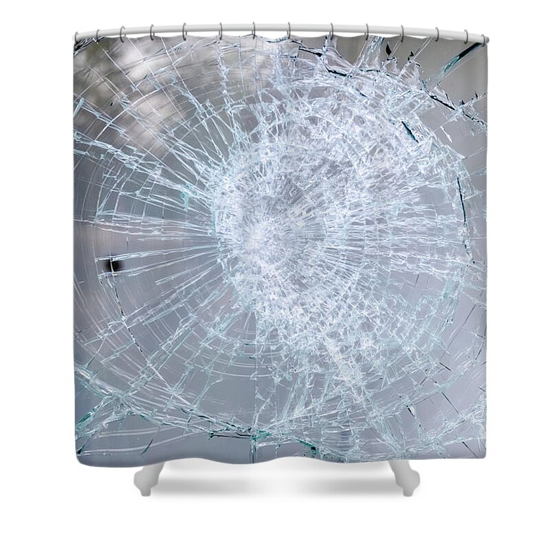 Accident Shower Curtain featuring the photograph Detail of a broken glass of a window. by Joaquin Corbalan