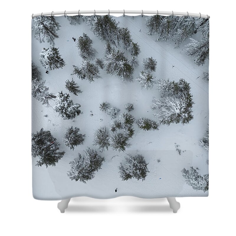Winter Shower Curtain featuring the photograph Drone aerial scenery of mountain snowy forest and people playing in snow. Wintertime season by Michalakis Ppalis