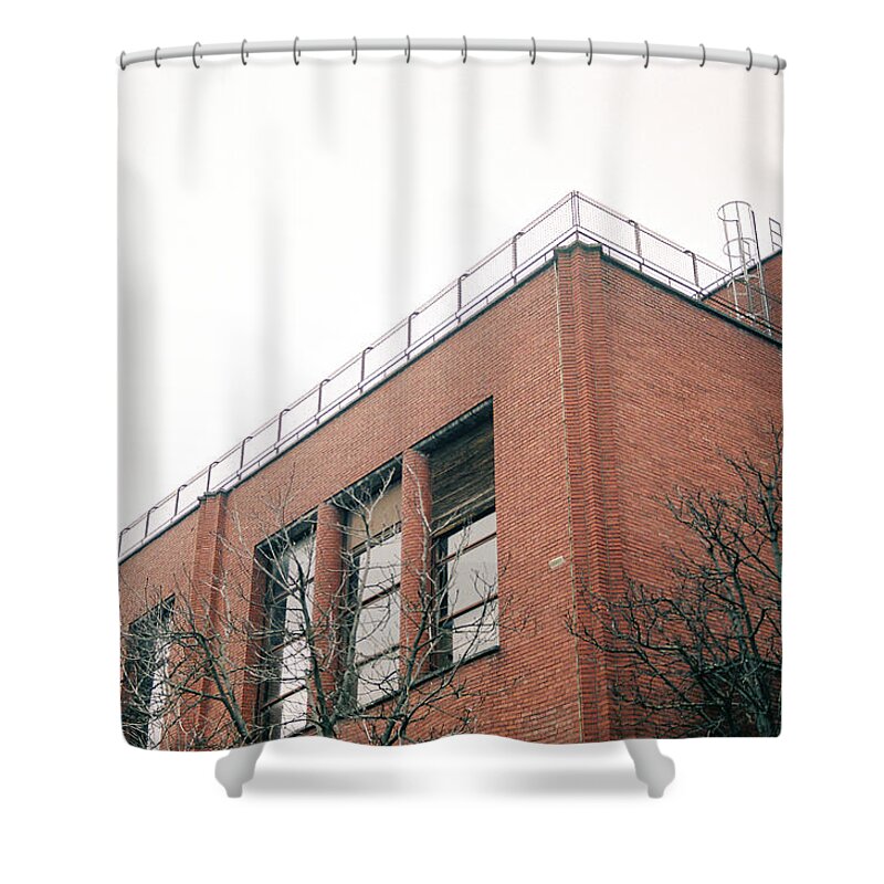 Facade Shower Curtain featuring the photograph Facade of industrial building made of bricks by Barthelemy De Mazenod