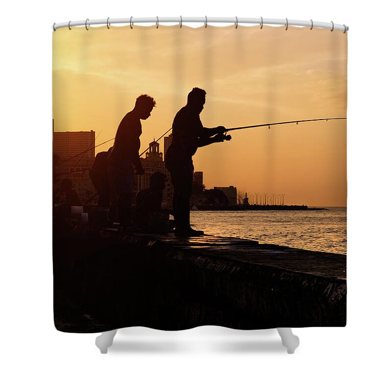 Cuba Shower Curtain featuring the photograph Fishermen at sunset in Havana by Karel Miragaya