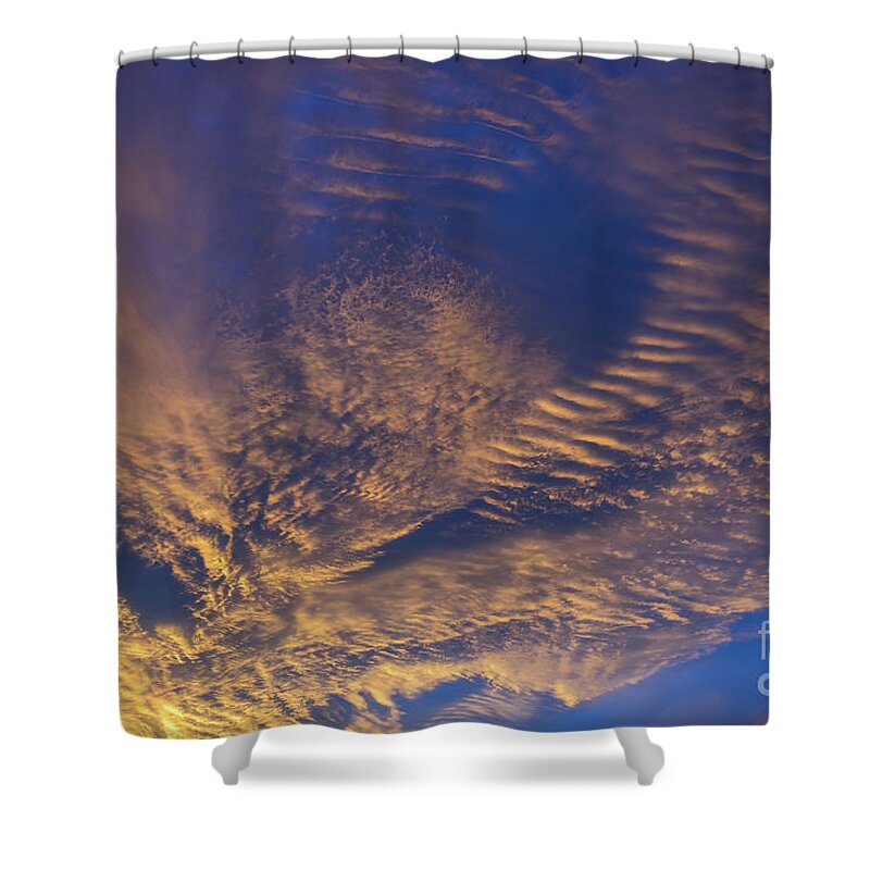 Clouds Shower Curtain featuring the photograph Golden and dark blue cloudscape at sunset by Adriana Mueller