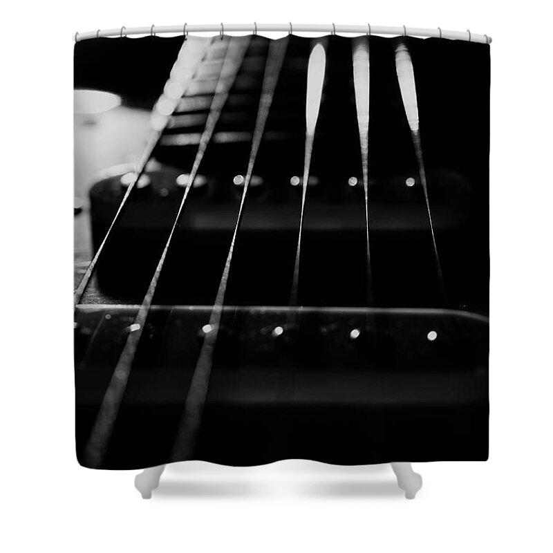 Abstract Shower Curtain featuring the photograph Guitar Cords Low Key Black and White Abstract Still Life Guitar Photograph by PIPA Fine Art - Simply Solid