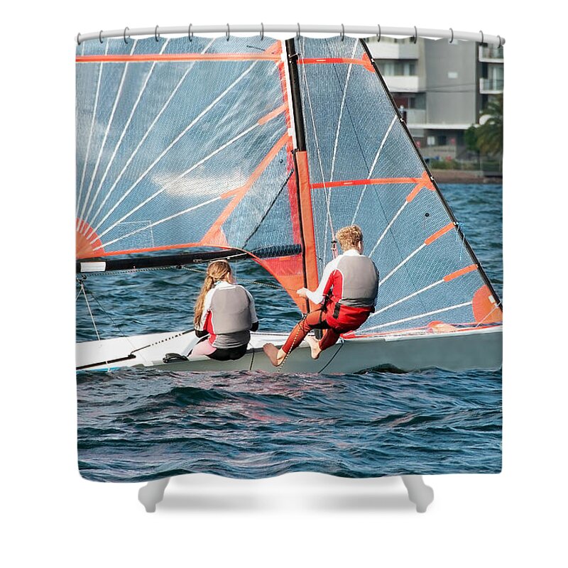 Csne55b Shower Curtain featuring the photograph High school students Sailing small sailboat in competition on a by Geoff Childs