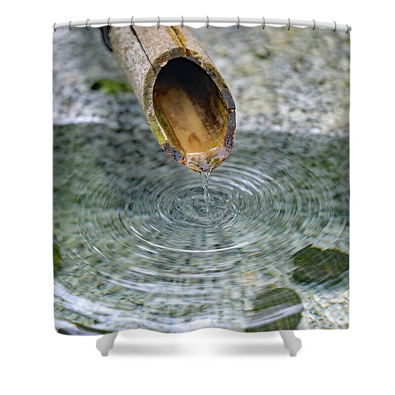 Water Fountain; Fountain; Japanese Fountain; Japanese Garden; Zen; Water; Drip; Droplets; Bamboo; Pool; Stone; Pebbles; Green; Shower Curtain featuring the photograph In a Japanese Garden by Tina Uihlein