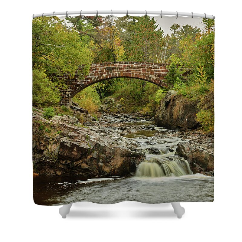 Water Shower Curtain featuring the photograph Lester river bridge by Paul Freidlund