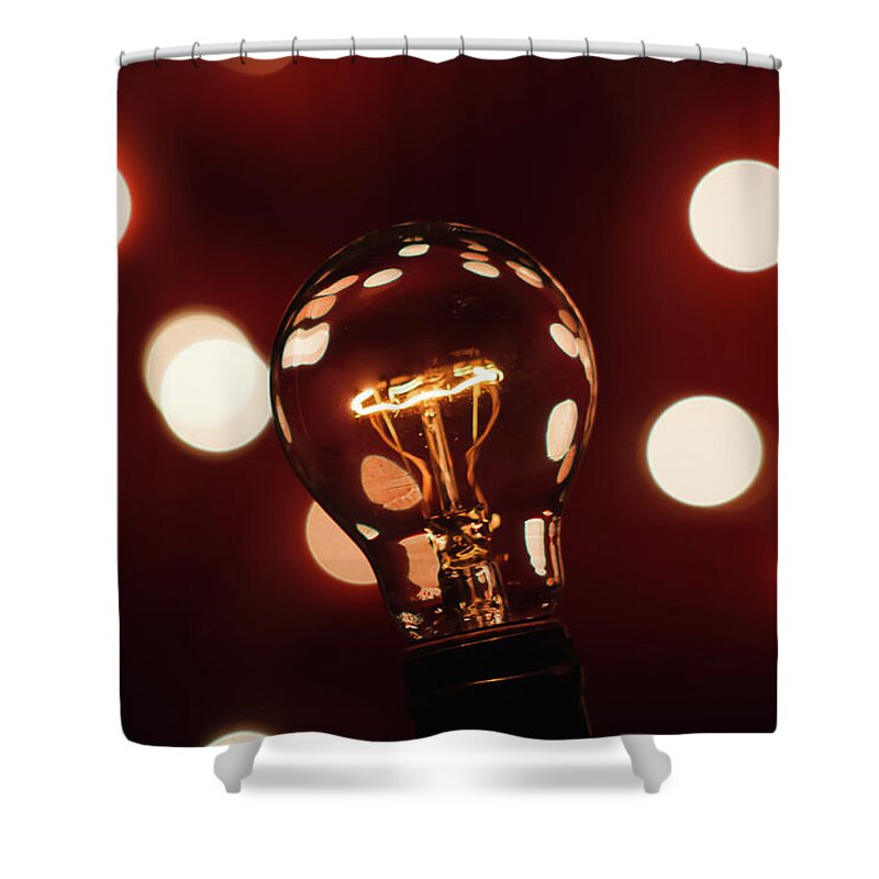 Light Bulb Shower Curtain featuring the photograph Light Bulb Bokeh by Gary Geddes