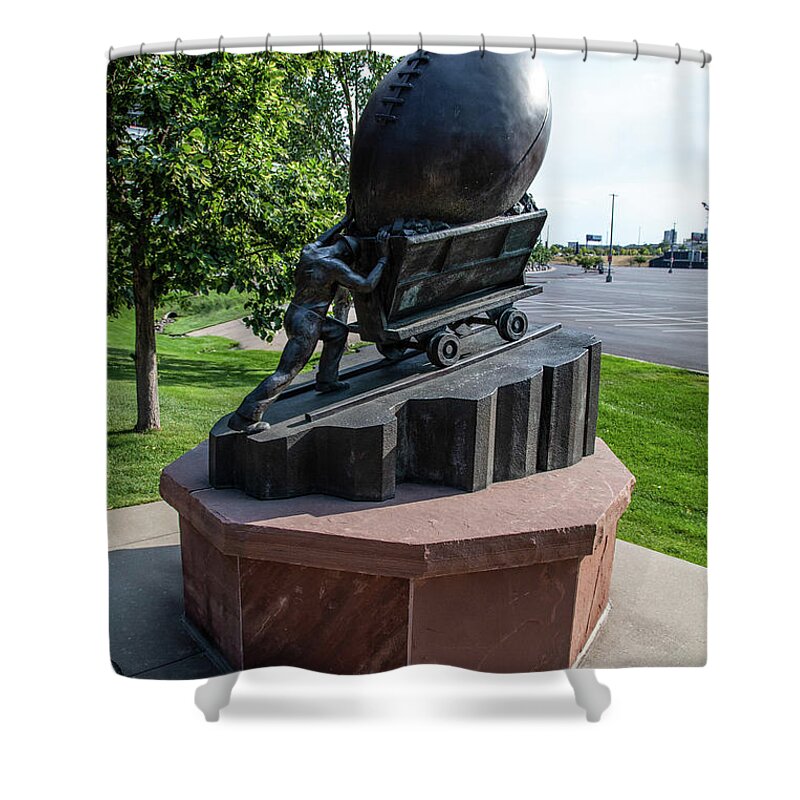Denver Colorado Shower Curtain featuring the photograph Mining and football statue outside Empower Field at Mile High Stadium in Denver Colorado by Eldon McGraw