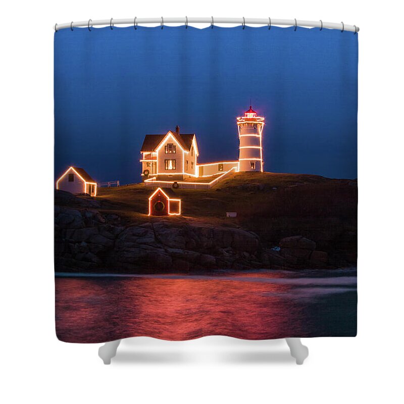 Maine Lighthouse Shower Curtain featuring the photograph Nubble lighthouse with Christmas Lights by Jeff Folger