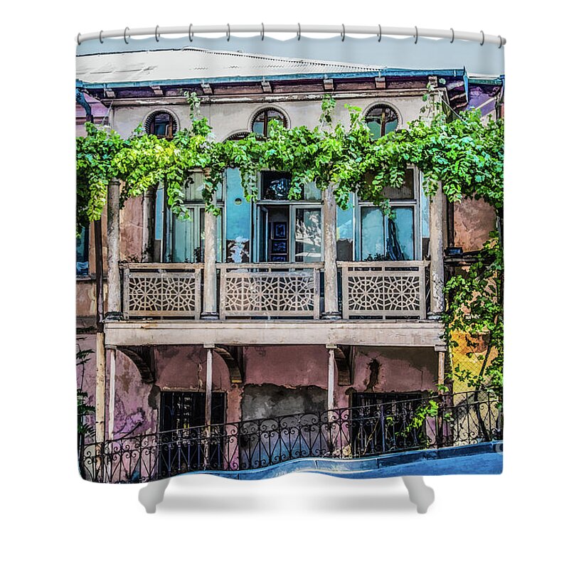 Tiflis Shower Curtain featuring the photograph Old ornate grungy house in Tbilisi Georgia covered with grape vines by Susan Vineyard
