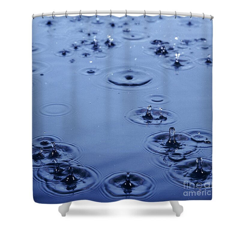 Rain Shower Curtain featuring the photograph Rain Drops on Water by Warren Photographic