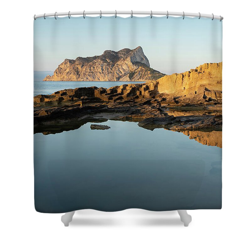 Mediterranean Shower Curtain featuring the photograph Reflection of rocks in the calm Mediterranean Sea at sunrise 2 by Adriana Mueller
