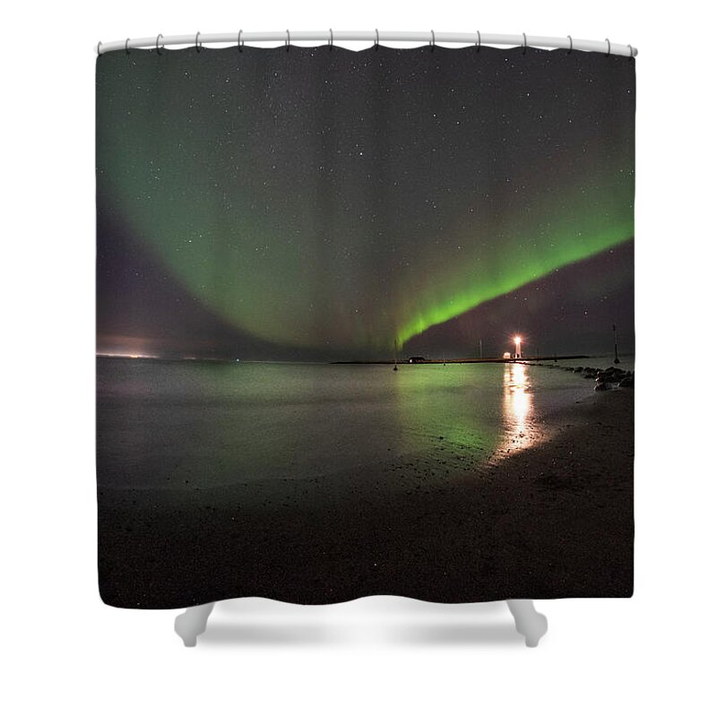 Reykjavik Shower Curtain featuring the photograph Reykjavik Iceland Beautiful Northern Lights at the Grotta Lighthouse Green Blast by Toby McGuire