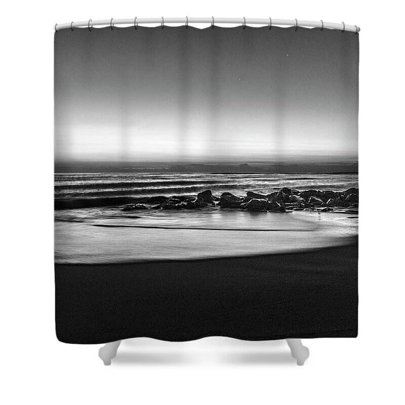 Birds Shower Curtain featuring the photograph Rocky Beach at Dawn Black and White by Debra and Dave Vanderlaan