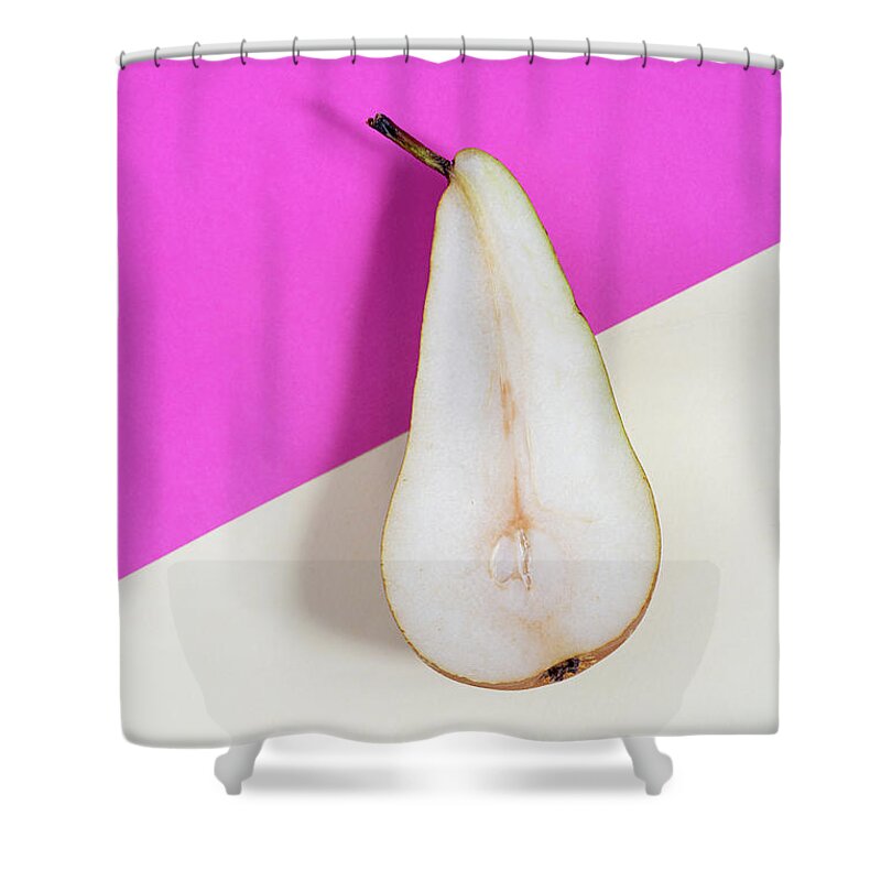 Still-life Shower Curtain featuring the photograph Slice of healthy pear fruit on a colourful background. by Michalakis Ppalis