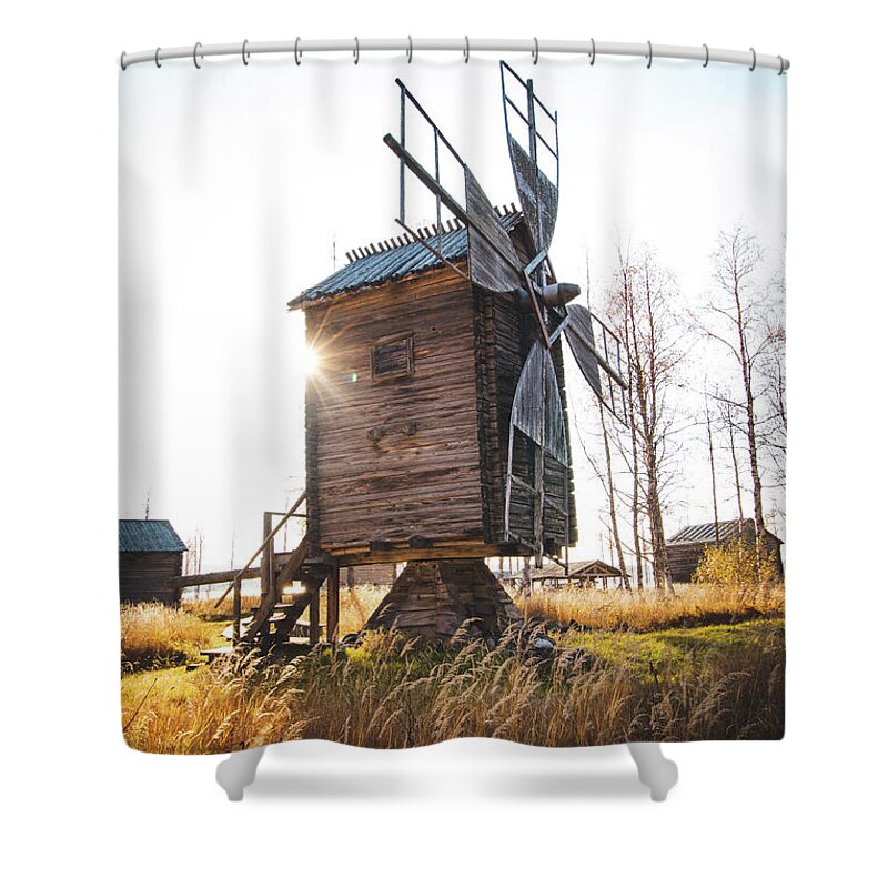 Medieval Shower Curtain featuring the photograph Small wooden mill with beautiful sun star by Vaclav Sonnek