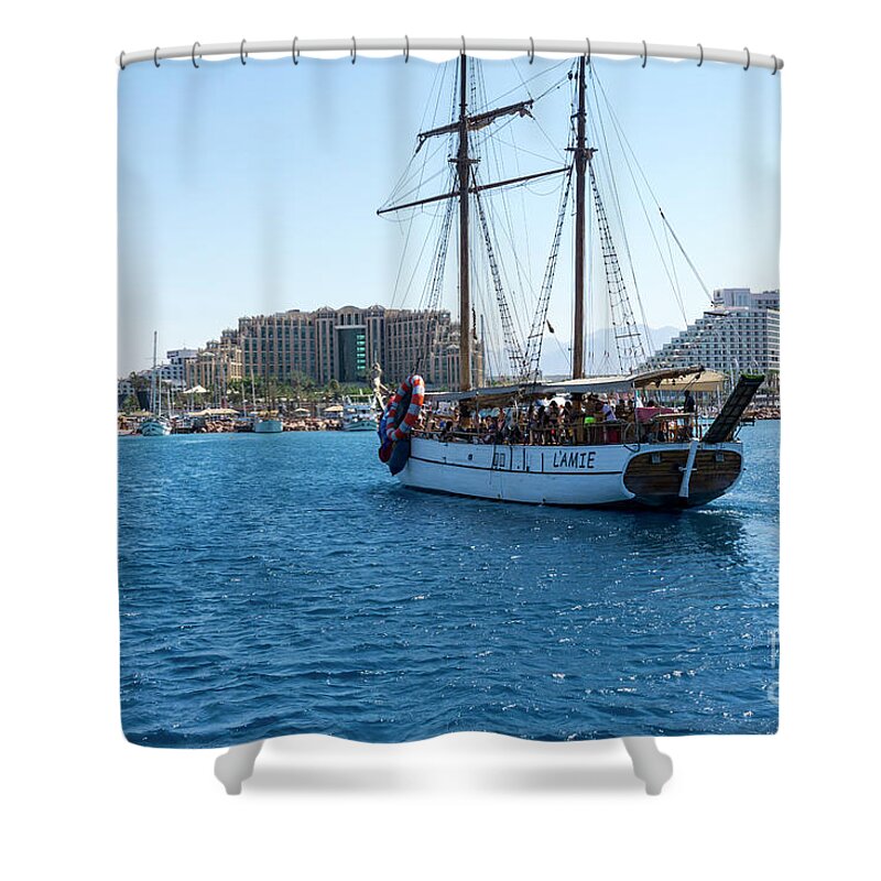 Gulf Of Aqaba Shower Curtain featuring the photograph The excursion boat L'Amie cruises in the Gulf of Aqaba off the r by William Kuta