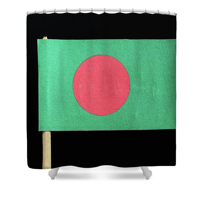  Bangladesh Shower Curtain featuring the photograph The national flag of Bangladesh on toothpick on black background. A red disc on a green field by Vaclav Sonnek