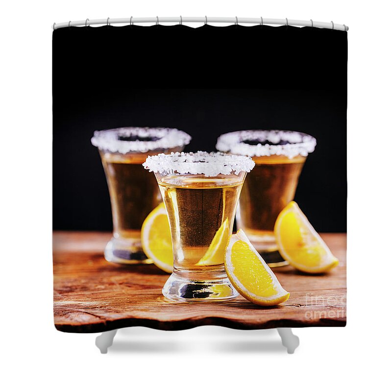 Tequila Shower Curtain featuring the photograph Tree shot glasses of Mexican tequila cocktail with lemon slices by Jelena Jovanovic