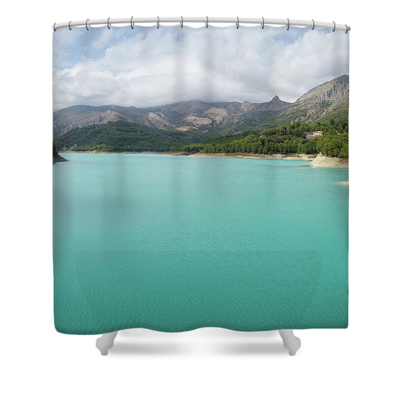 Guadalest Shower Curtain featuring the photograph Turquoise blue water and mountain landscape by Adriana Mueller