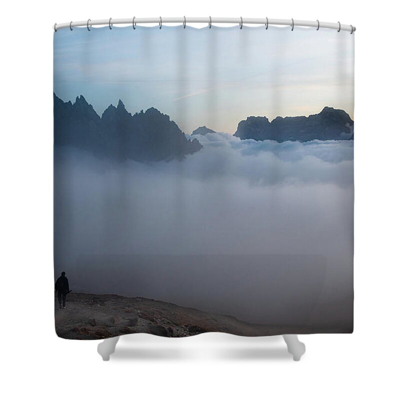 Italian Alps Shower Curtain featuring the photograph Unrecognized man trekking at the hiking path at Tre Cime in South Tyrol in Italy. by Michalakis Ppalis