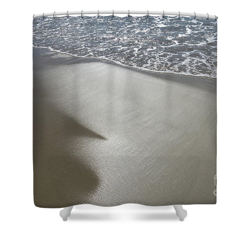 Sandy Beach Shower Curtain featuring the photograph Wet sand, sea water and reflections of sunlight by Adriana Mueller