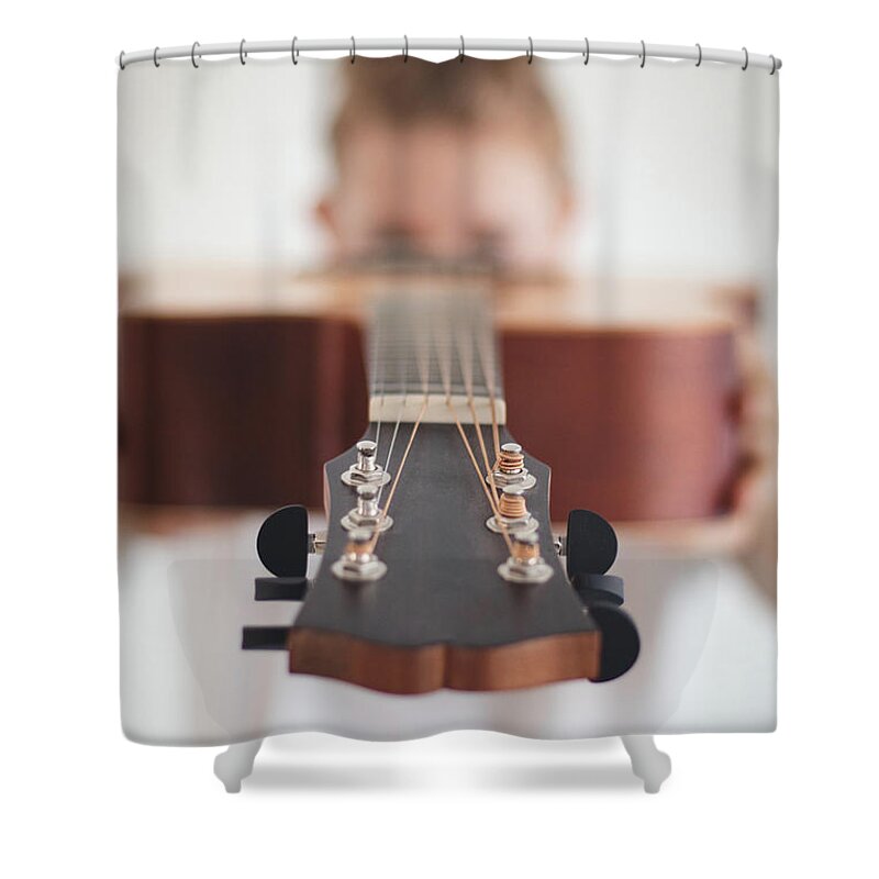 Excited Shower Curtain featuring the photograph Wooden guitar head by Vaclav Sonnek