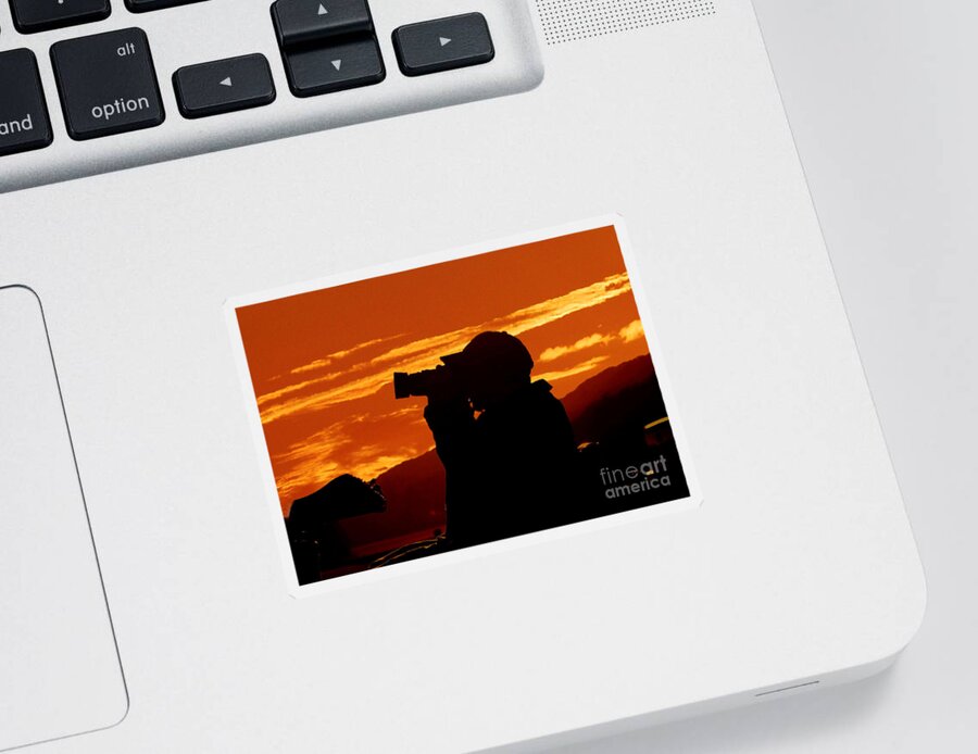 Sunset Sticker featuring the photograph A Photographer Enjoying His Work by Kathy Baccari