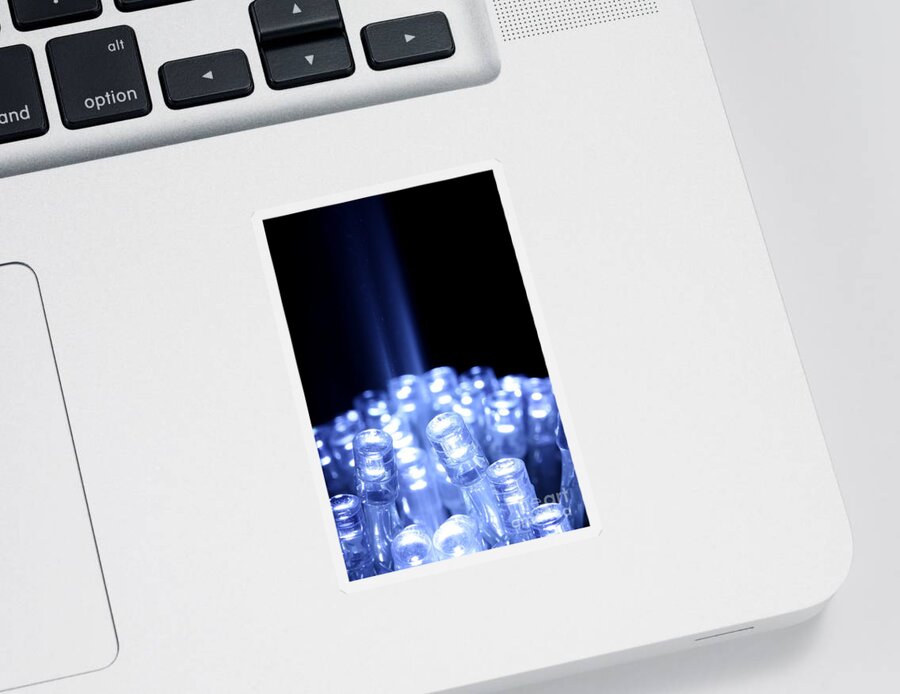 Abstract Sticker featuring the photograph Blue LED lights with light beam by Simon Bratt