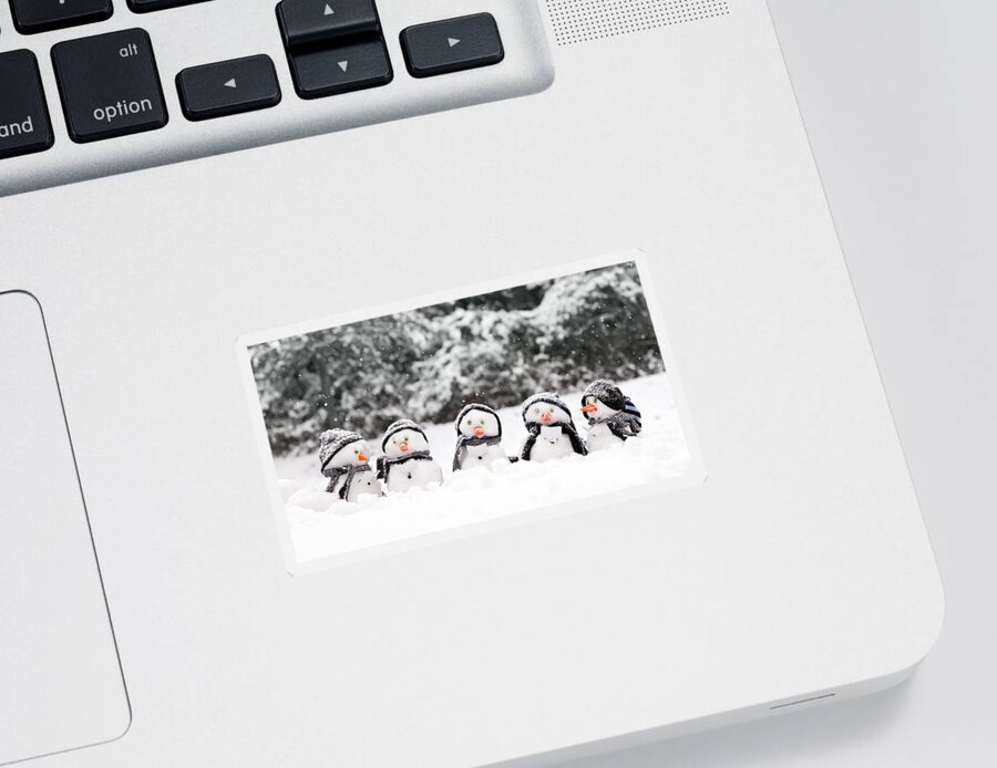 Snowmen Sticker featuring the photograph Little snowmen in a group by Simon Bratt