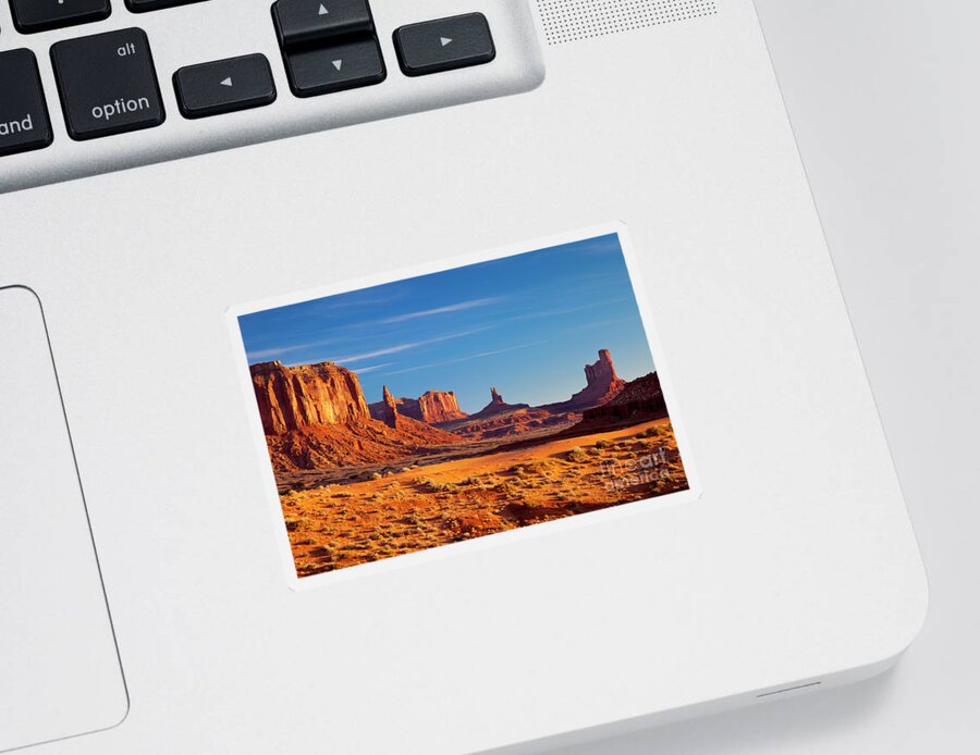 Monument Valley Sticker featuring the photograph Sunrise over Monument Valley by Brian Jannsen