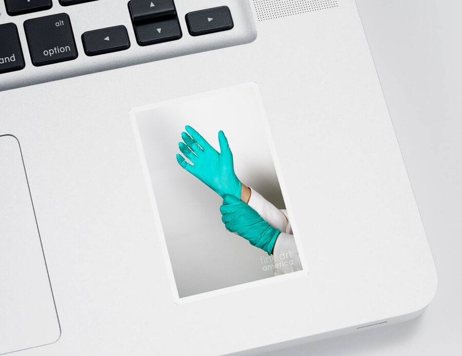 Adult Sticker featuring the photograph Doctor Putting On Gloves by Photo Researchers
