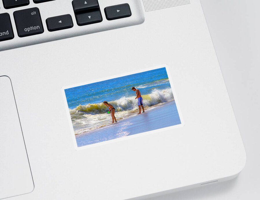Bonnie Follett Sticker featuring the photograph Beach Couple at the Seashore by Bonnie Follett