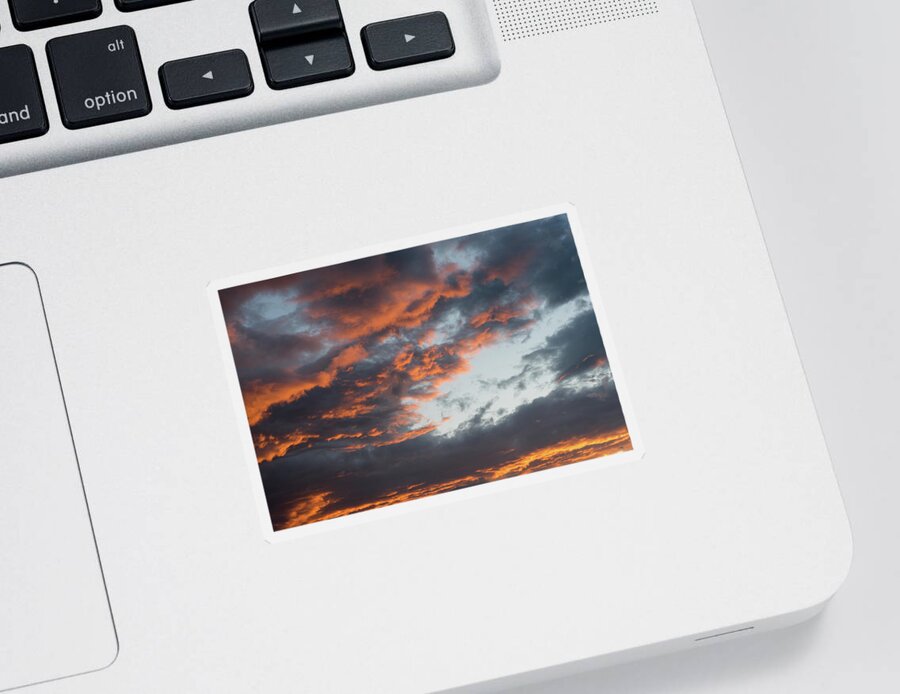 Stormy Clouds Sticker featuring the photograph Dramatic sunset sky with orange cloud colors by Michalakis Ppalis