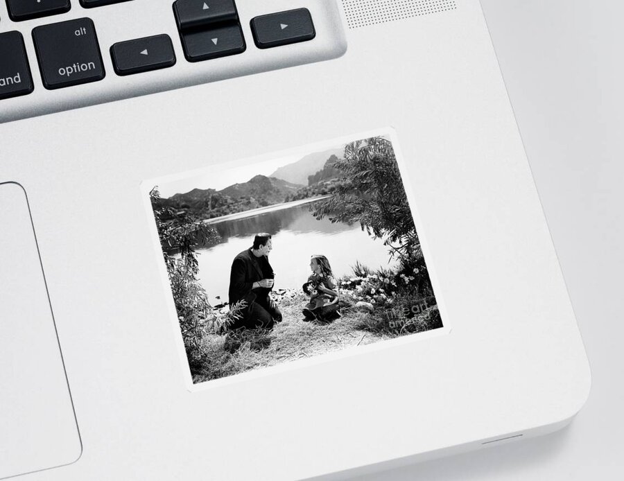Frankenstein Sticker featuring the photograph Frankenstein by the lake with little girl Boris Karloff by Vintage Collectables
