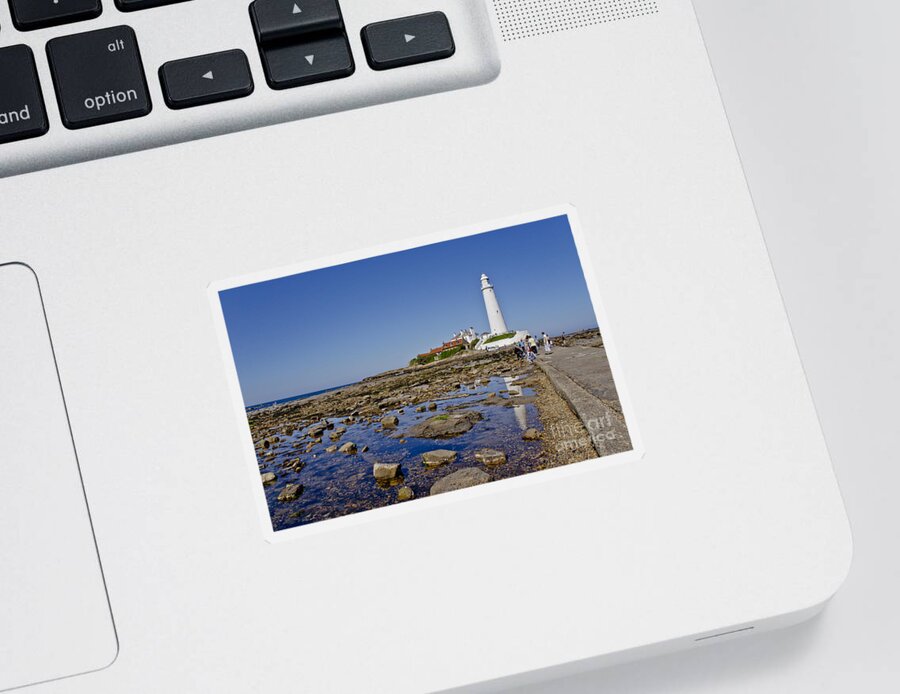 Lighthouse Sticker featuring the photograph Lighthouse at low tide. by Elena Perelman