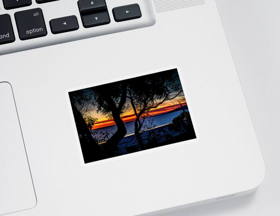 Sunset Silhouettes Sticker featuring the photograph Silhouettes Over Blue Water by Gene Parks