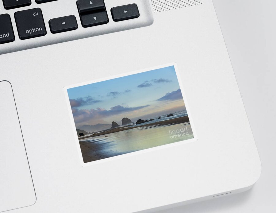 Cannon Beach Sticker featuring the photograph Skimming along the beach at sunset by Paul Quinn