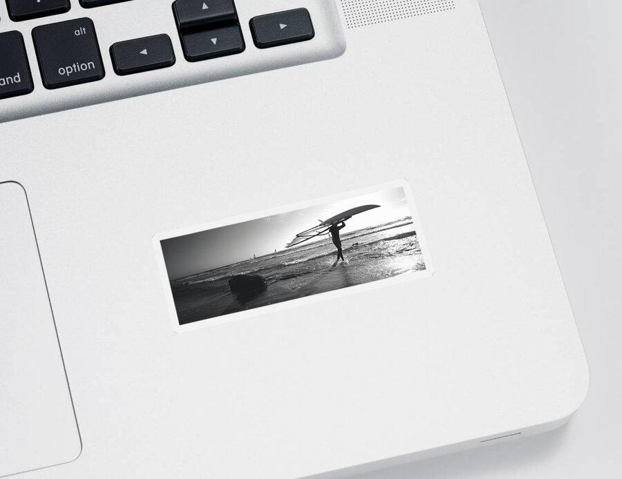 Photography Sticker featuring the photograph Man Carrying A Surfboard Over His Head by Panoramic Images