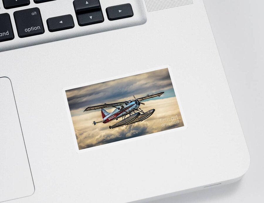 Seaplane Sticker featuring the photograph Seaplane in the Anchorage sky by Lyl Dil Creations