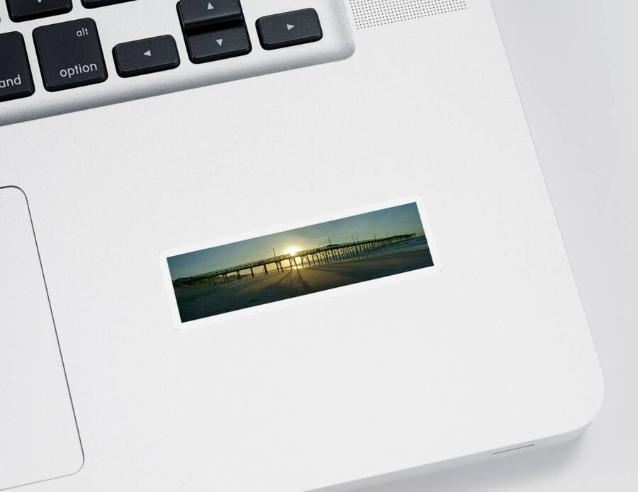 Beach Scene Sticker featuring the photograph Sunrise at the Jolly Roger Pier #1 by Mike McGlothlen