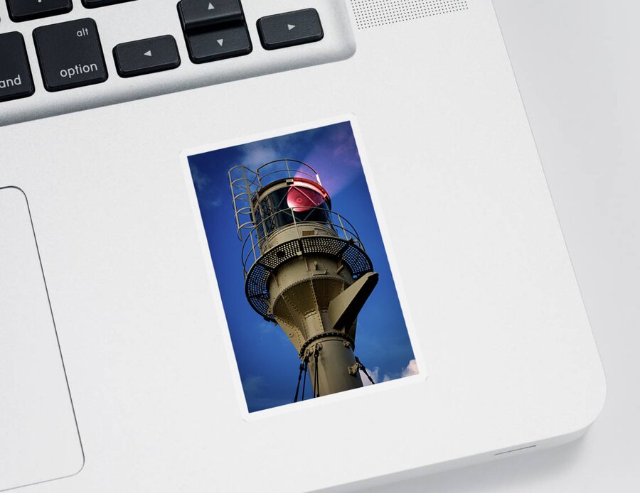 Lighthouse Sticker featuring the photograph Beam of light from a lighthouse. by Bernhard Schaffer