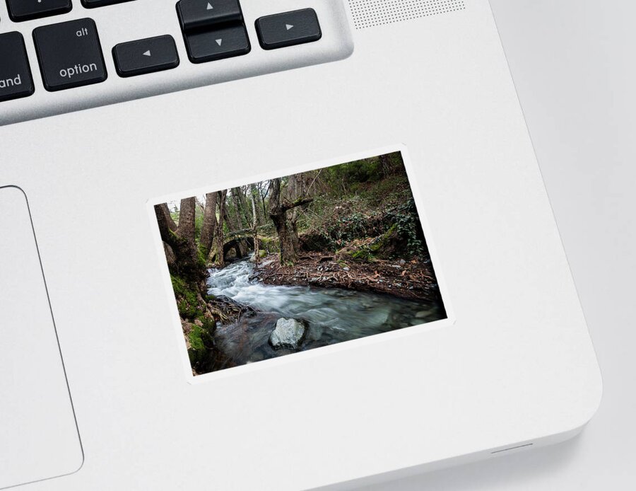 River Sticker featuring the photograph Beautiful medieval stoned bridge with river full with water flo by Michalakis Ppalis