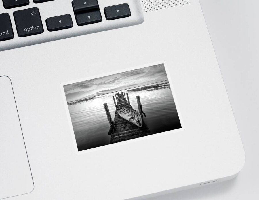 Black Sticker featuring the photograph Canoe on the Dock Black and White by Debra and Dave Vanderlaan