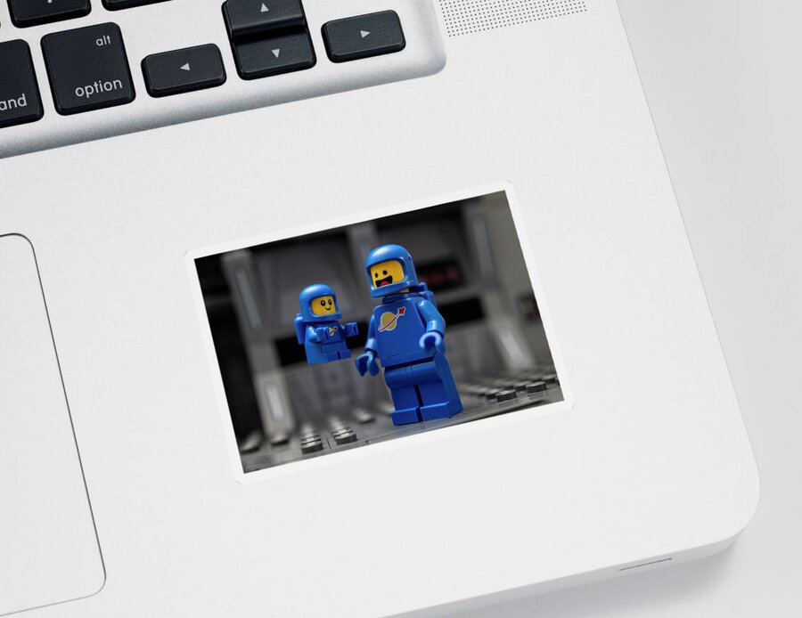 Lego Sticker featuring the photograph Classic LEGO Spaceman and Spacebaby first flight by Matt McDonald
