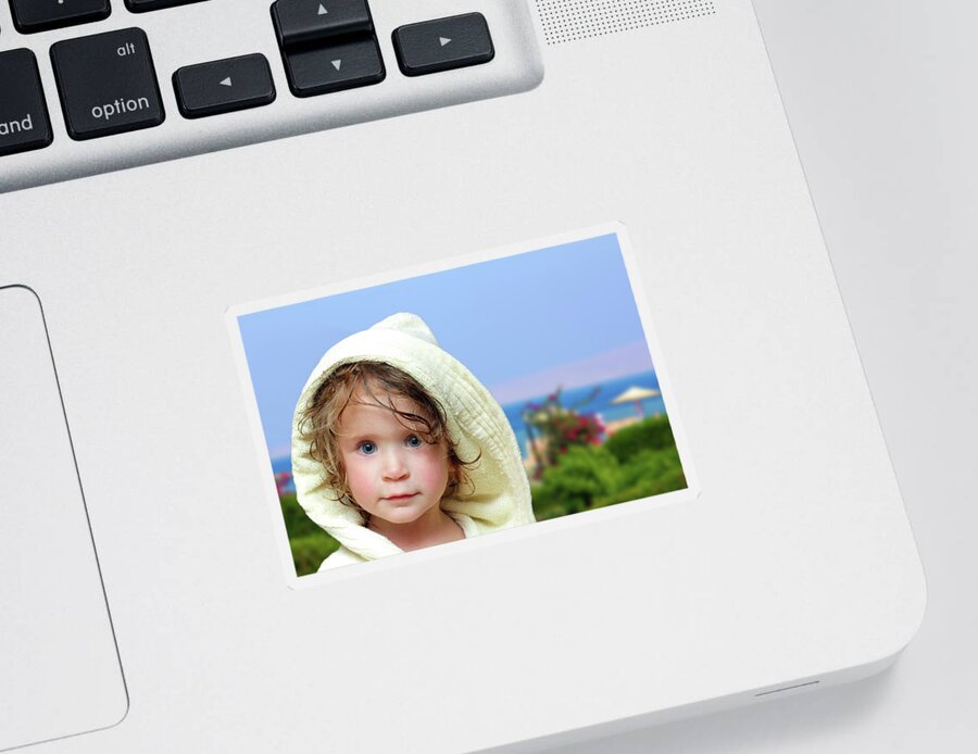 Childhood Sticker featuring the photograph Cute Girl In Bathrobe On Beach by Mikhail Kokhanchikov