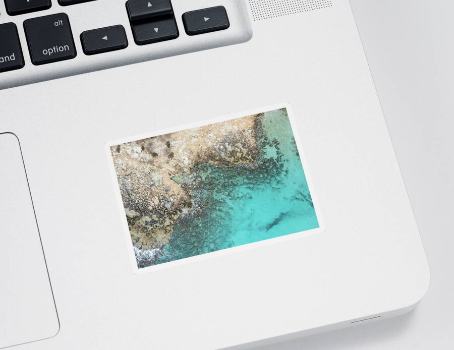 Rocky Beach Sticker featuring the photograph Drone aerial of rocky sea coast with transparent turquoise water. Seascape top view by Michalakis Ppalis