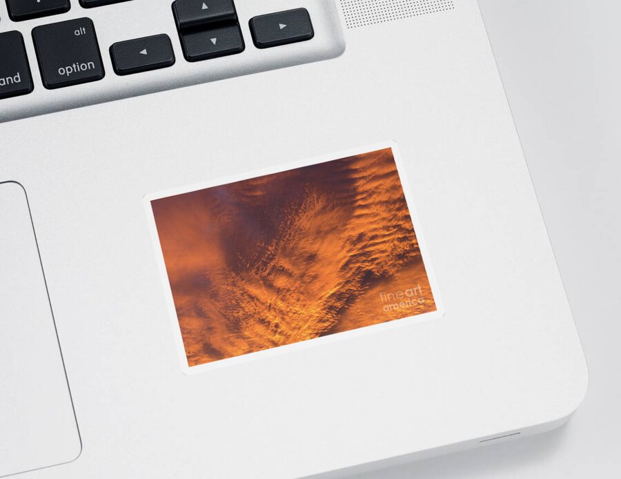 Clouds Sticker featuring the photograph Glowing sunset sky with deep orange clouds by Adriana Mueller