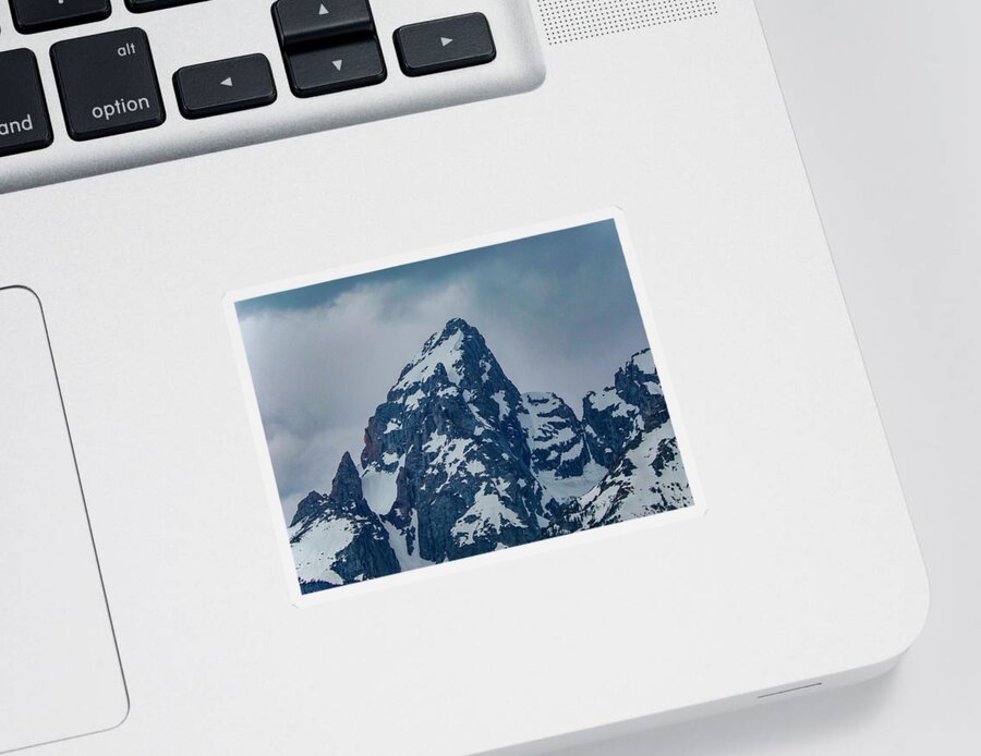 Grand Teton In Spring Sticker featuring the photograph Grand Teton Mountain Peak Moody by Dan Sproul