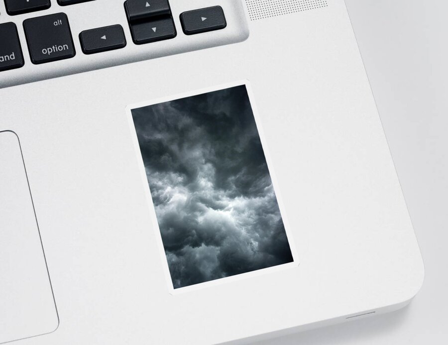 Clouds Sticker featuring the photograph Stormy clouds in the sky. by Bernhard Schaffer