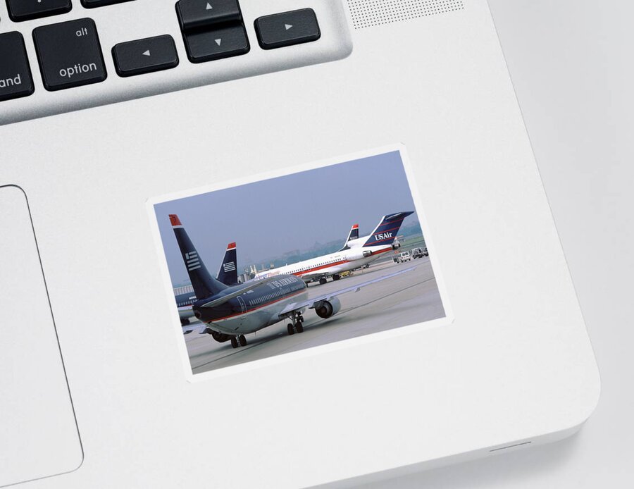 Us Airways Sticker featuring the photograph US Airways Boeing 737s at Washington Reagan Airport by Erik Simonsen